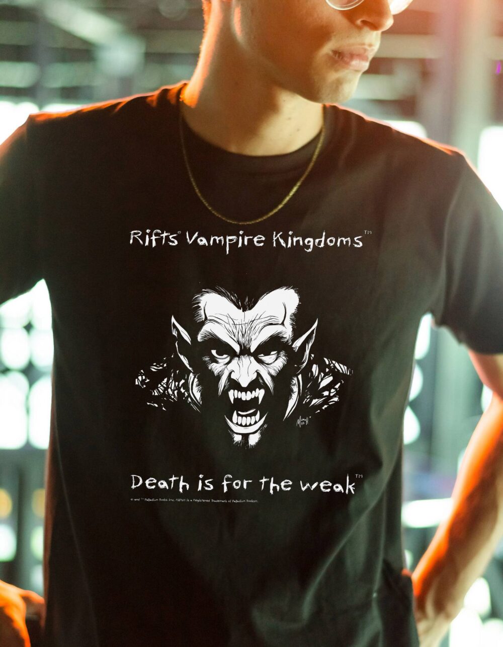 A black shirt with rifts vampire kingdoms, death is for the week written in white on it