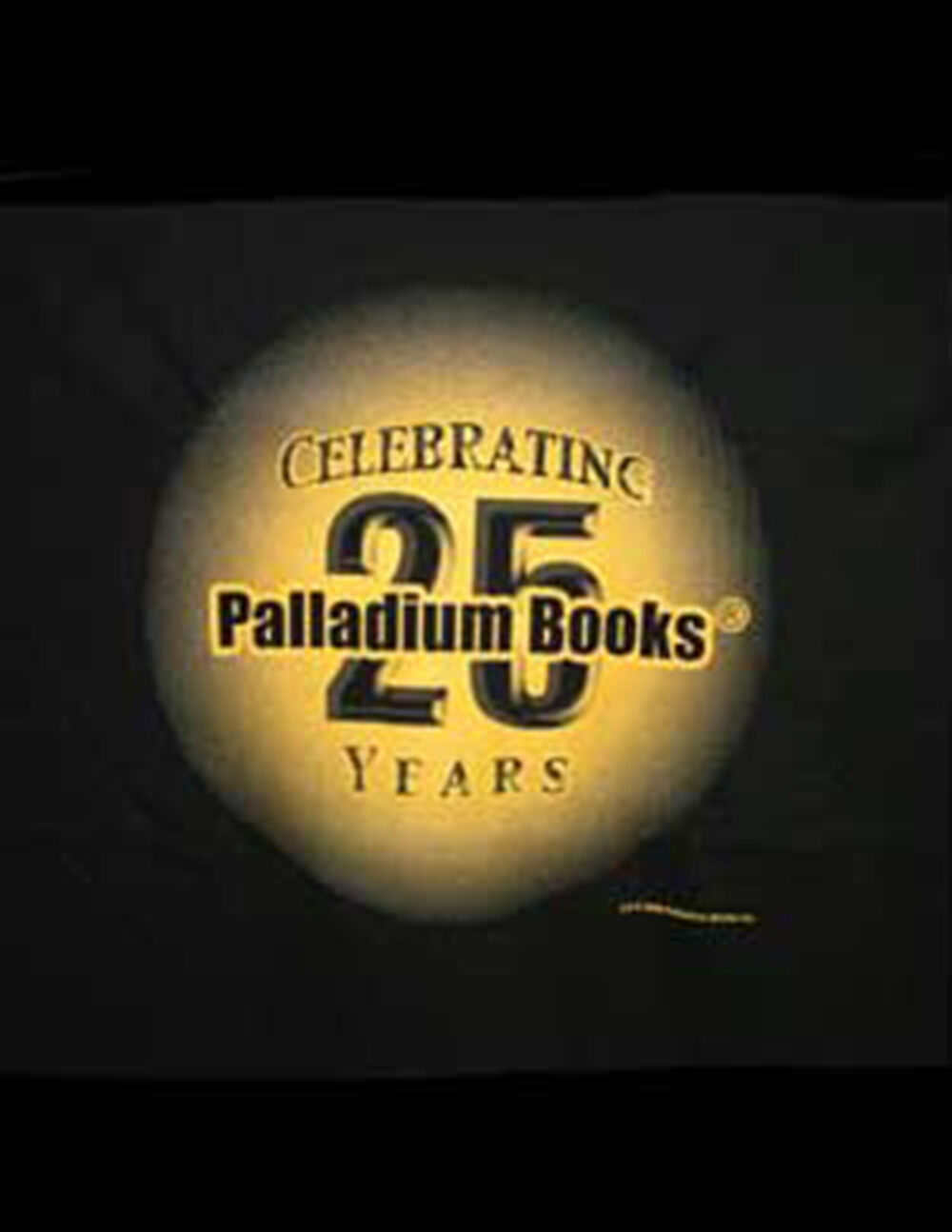 a black shirt with a yellow and black badge that reads: palladium books celebrating 25 years