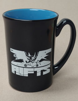 a black mug with a white rifts logo on the outside, the interior of the mug is cyan blue