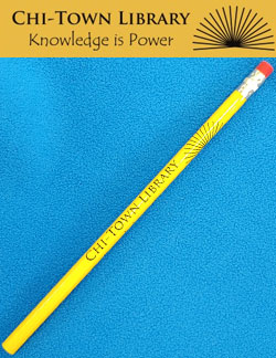 a green pencil with the text "Chi-town library, knowledge is power" printed on the side